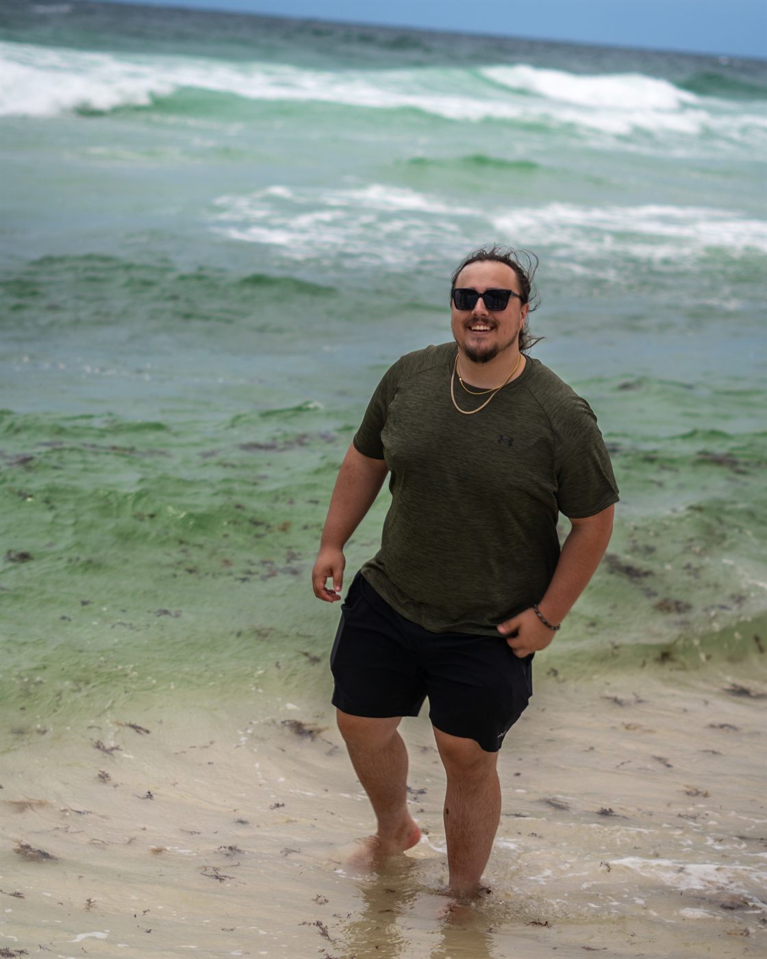 Jonathan Castro, founder of Reel Media Marketing, on the beach