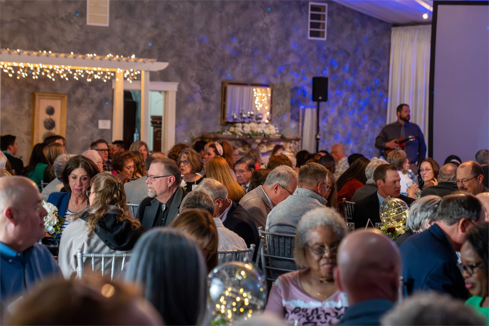 A packed room of guests at the Vision Dinner